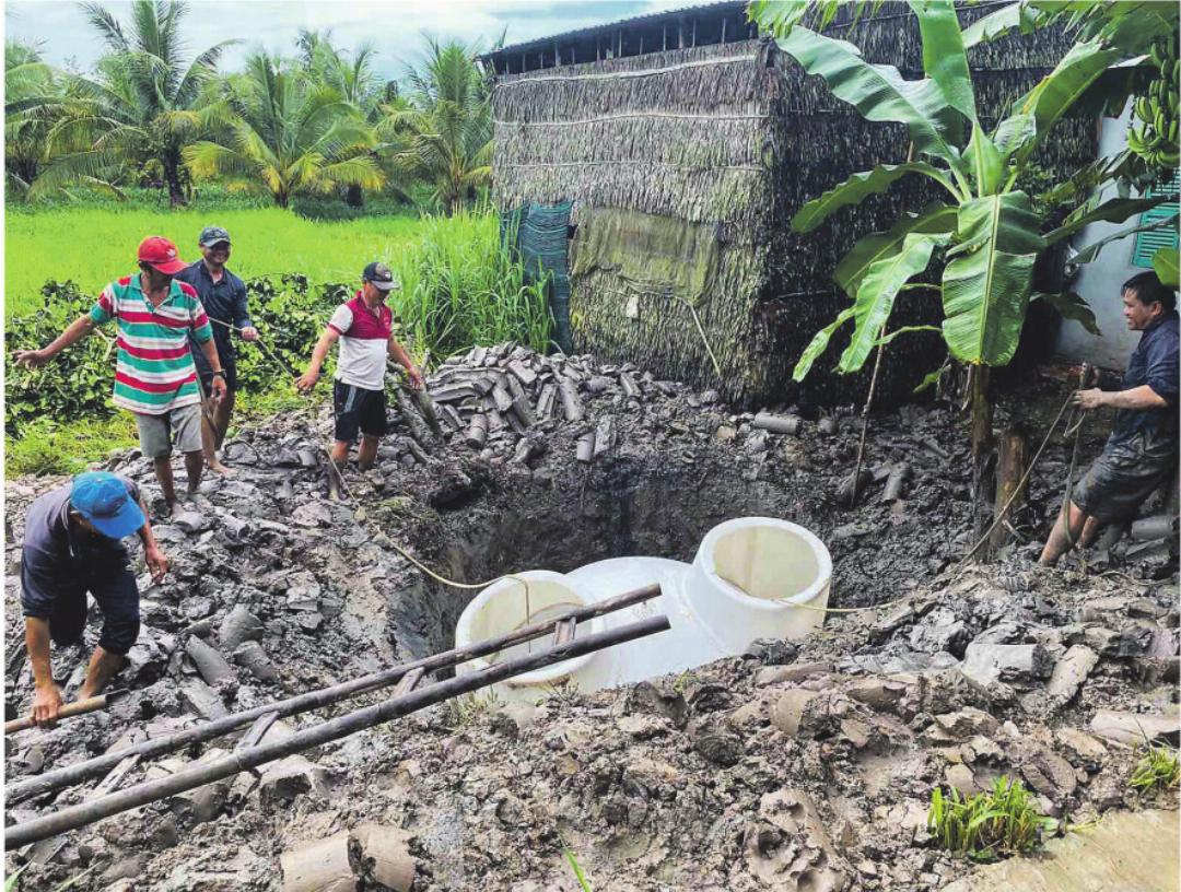 Vietnam: Eine Biogasanlage wird installiert. Vietnam: Eine Biogasanlage wird installiert.