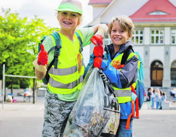 Dreckige Handschuhe, volle Abfallsäcke und glückliche Gesichter. Bild: zvg
